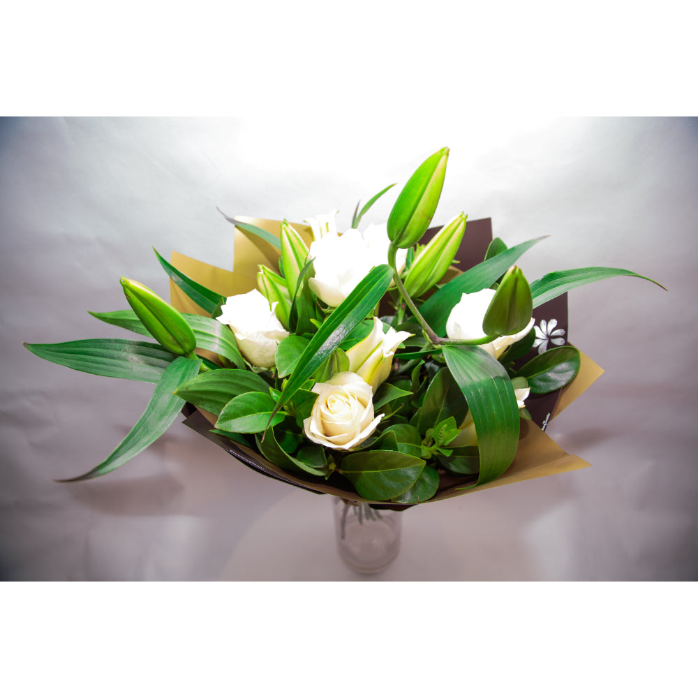 
                  
                    White Roses & Lilies
                  
                